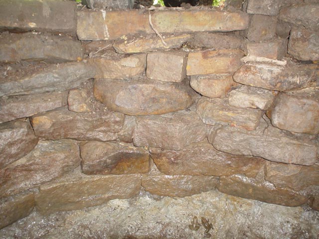 Stone wall built in spring basin